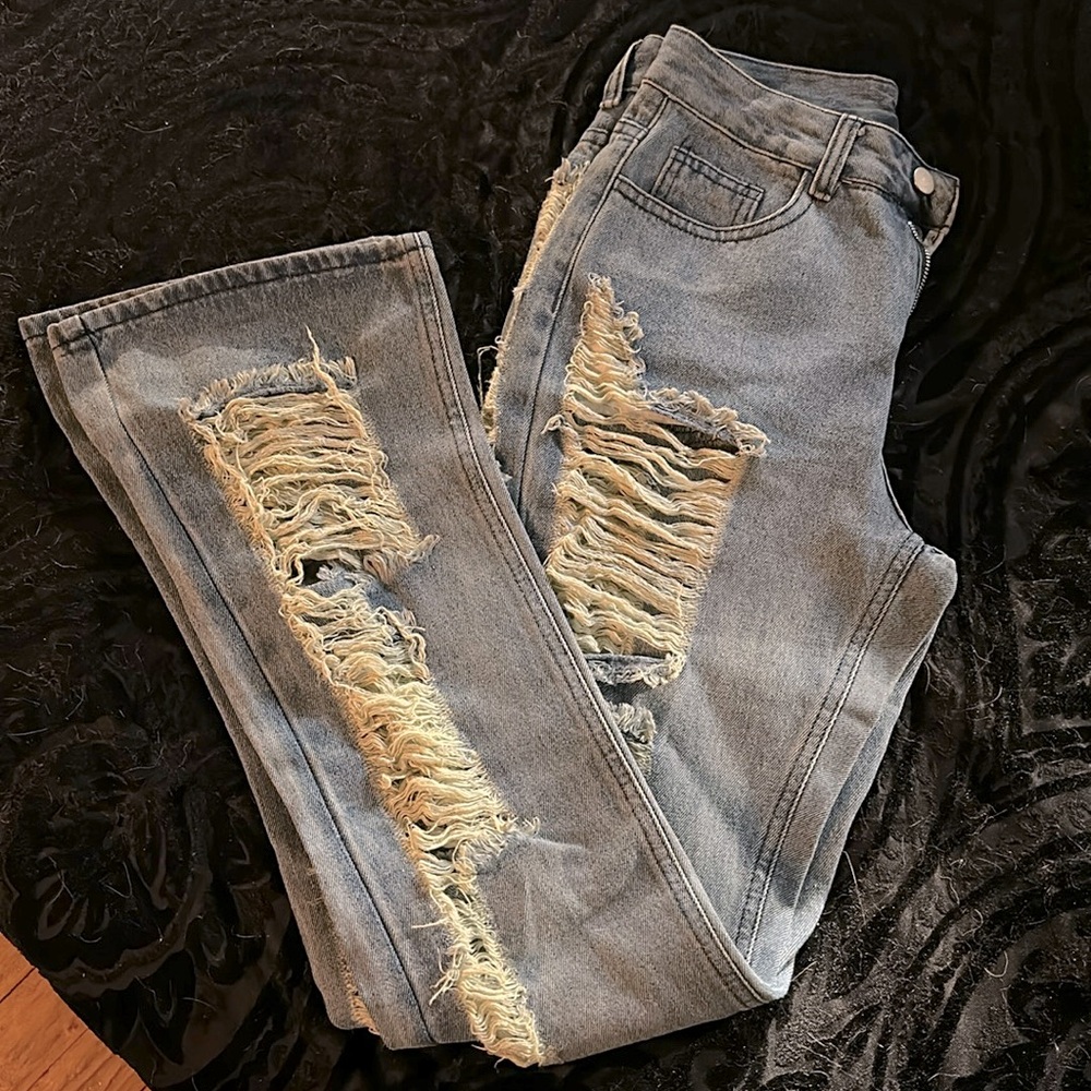 Light washed ripped flare jeans from SHEIN.